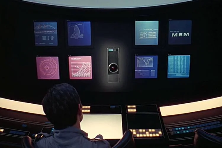 In 2001, a space odyssey, the HAL 9000 runs the ship, communicates with the crew in natural language and makes complex decisions.  Although it would be architected differently, and would not malfunction as is shown in the movie, today it would be 100% possible to build a system that does everything the HAL 9000 is shown doing in the film.  